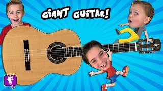 GIANT Guitar at a Museum with HobbyKidsTV [upl. by Grous714]