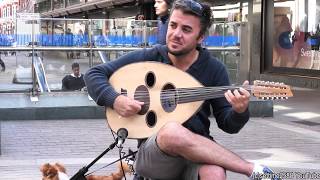 The quotOudquot Musical Instrument from the Middle East London Street Music [upl. by Alyakcim352]