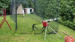 Batting Cage Clip with Heater Pitching Machine [upl. by Philly]