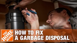 How to Fix a Garbage Disposal  The Home Depot [upl. by Yggam]